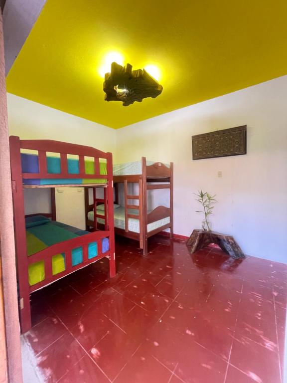Postel nebo postele na pokoji v ubytování VAGO HOSTEL