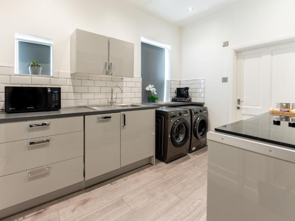 Kuchyň nebo kuchyňský kout v ubytování Tettenhall Lodge Apartment
