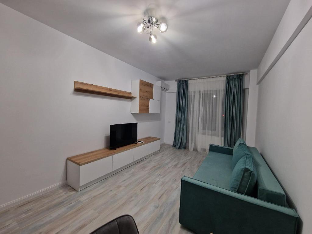 Μια τηλεόραση ή/και κέντρο ψυχαγωγίας στο Toka Apartments 2 Rooms
