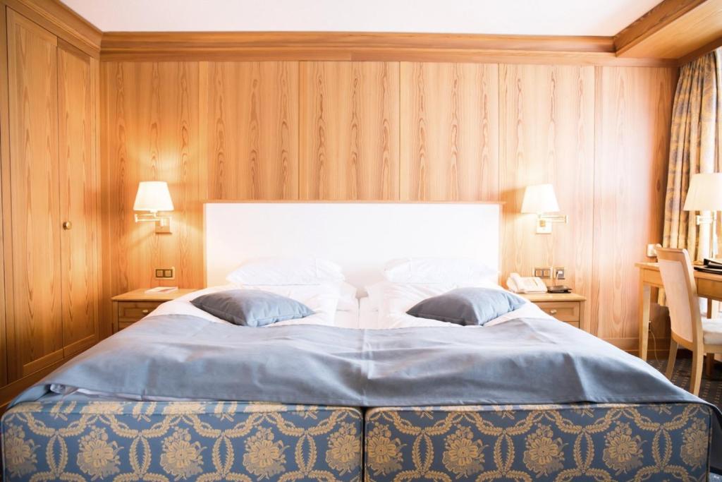 Postel nebo postele na pokoji v ubytování The Grand Arosa - Pop-Up Hotel
