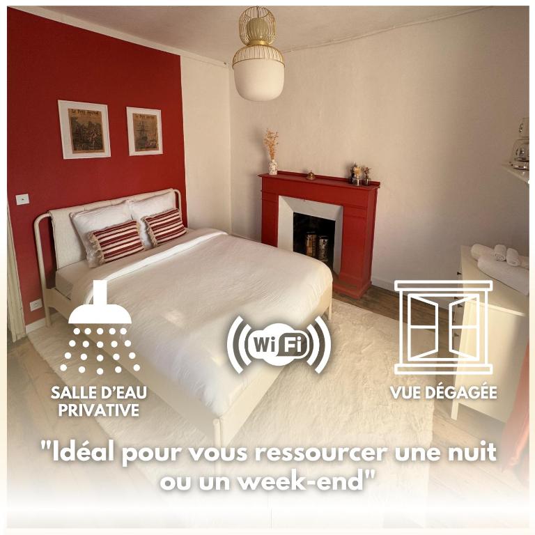 Postel nebo postele na pokoji v ubytování Chambre Rouge