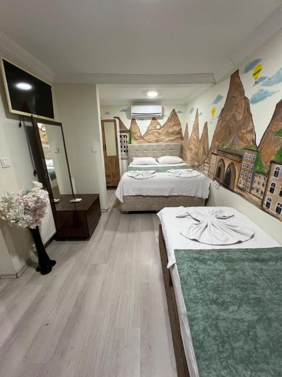 Postel nebo postele na pokoji v ubytování Sultanahmet blue yacht house