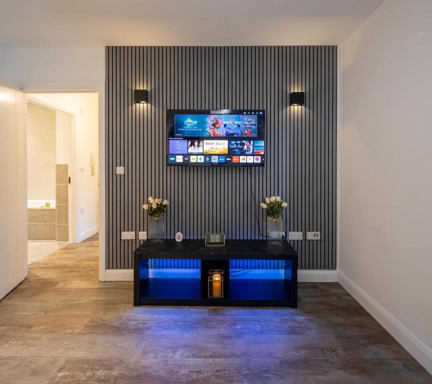 Μια τηλεόραση ή/και κέντρο ψυχαγωγίας στο Stylish Modern Apartment