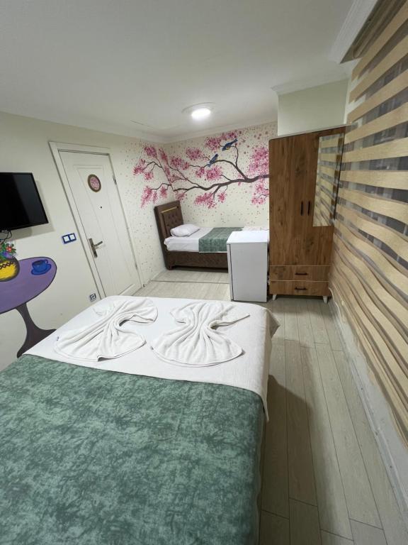Postel nebo postele na pokoji v ubytování Sultanahmet blue yacht house