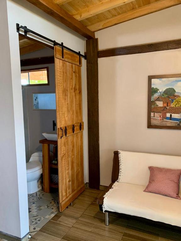 Letto o letti in una camera di Quirama Lodge