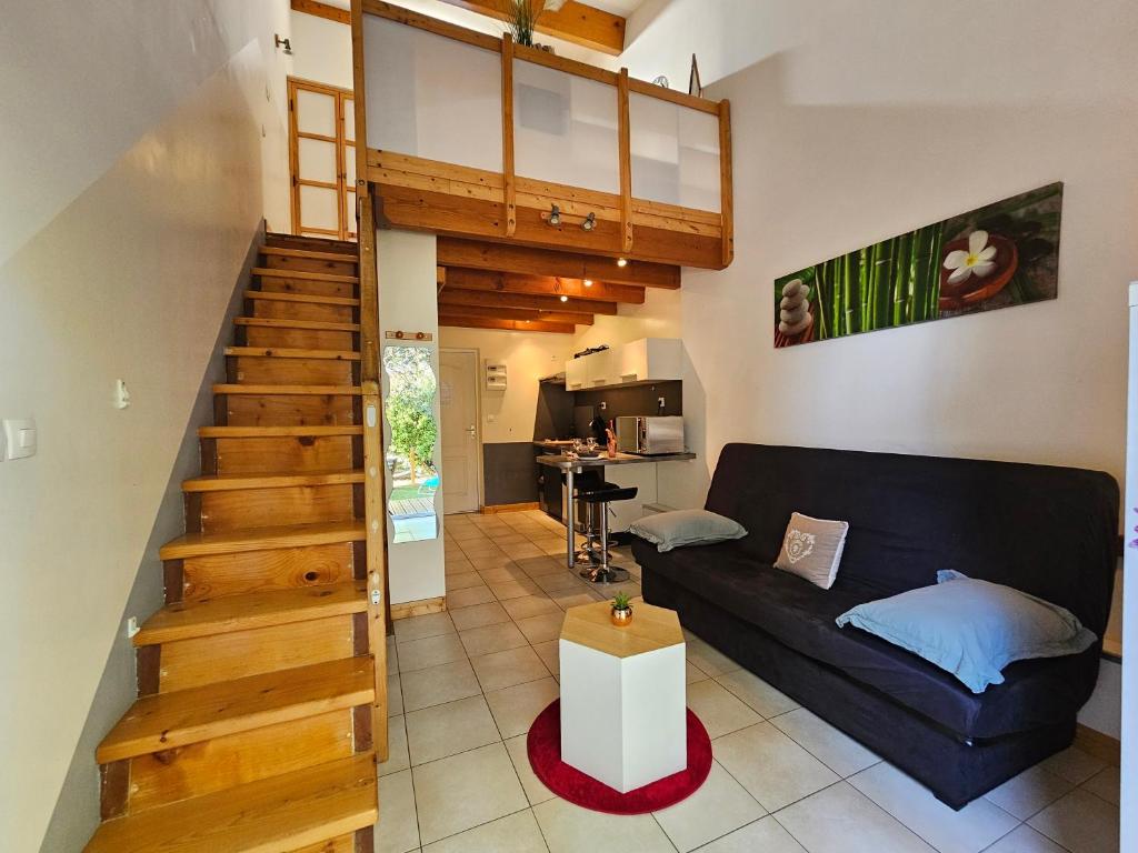 Χώρος καθιστικού στο Gîte Le Muscat L'Escapade Des Flamants Roses