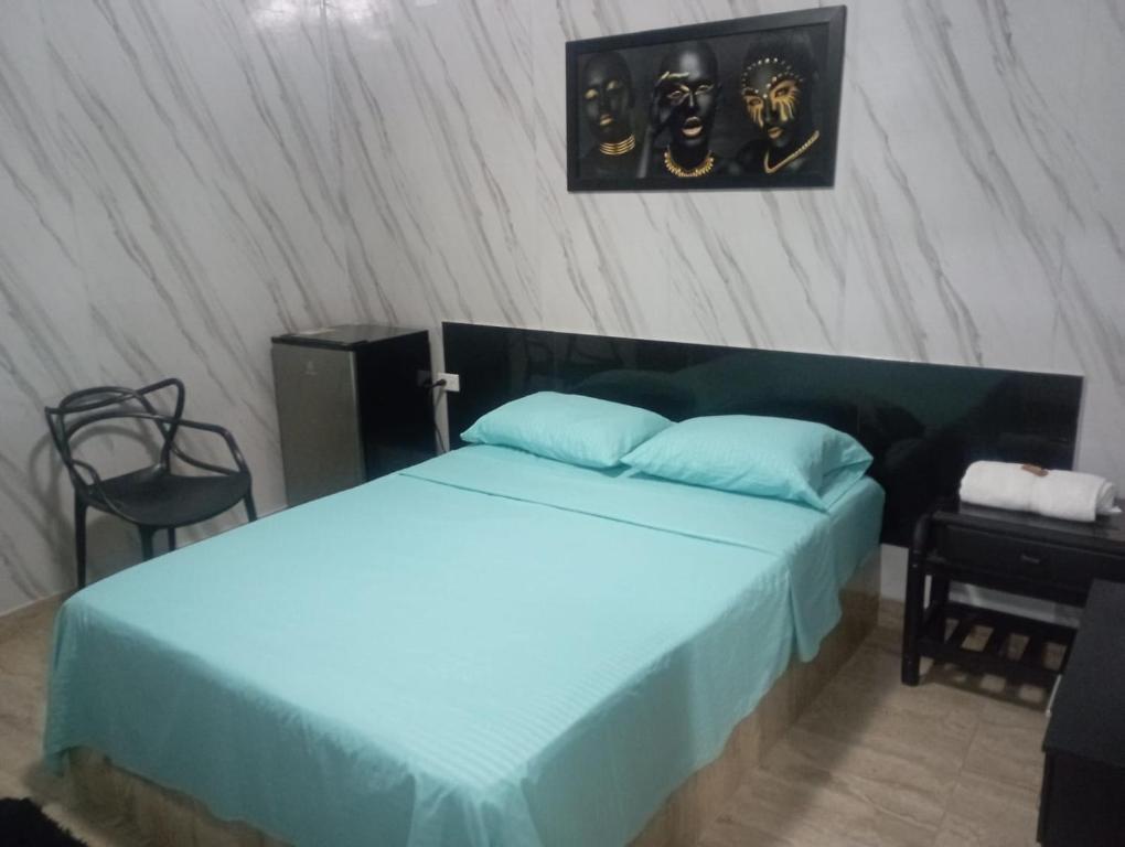 Postel nebo postele na pokoji v ubytování Hotel Palmari