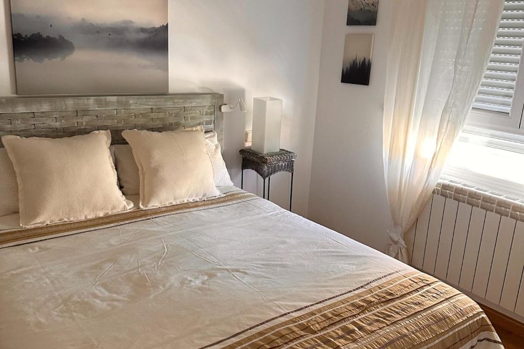 Una cama o camas en una habitación de La casa de Cris