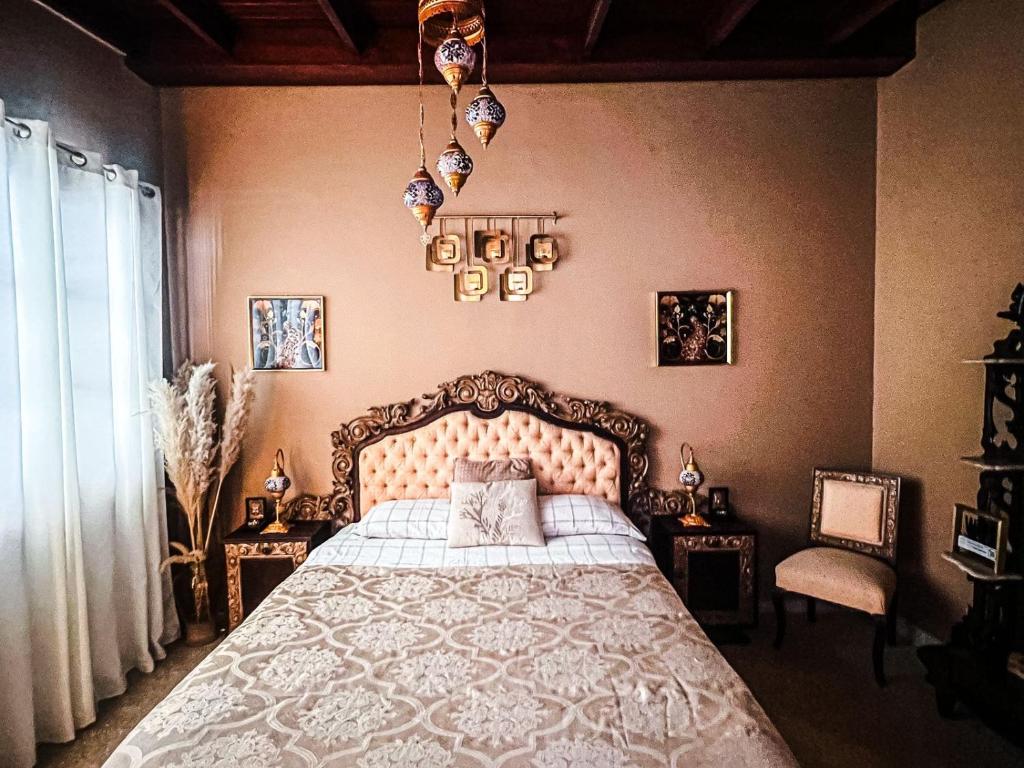a bedroom with a large bed and a window at ORHO HOTEL BOUTIQUE PANAMA Tocumen Airport free shuttle highway round trip 15 minuts in Tocumen