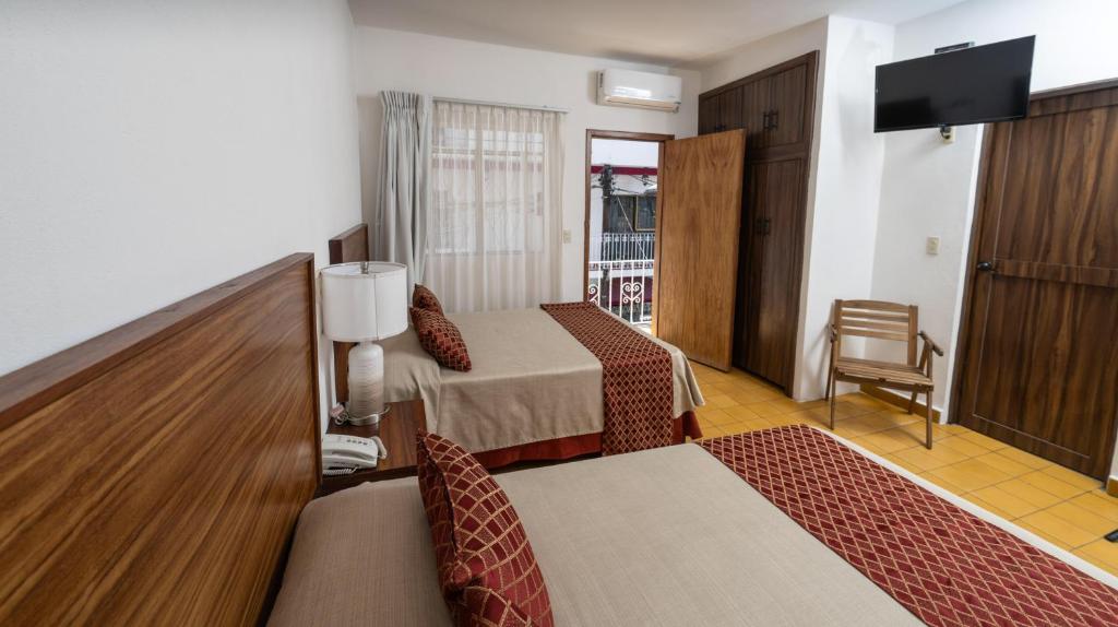 Hotel Encino Malecón Centro Puerto Vallarta - Quadruple Room