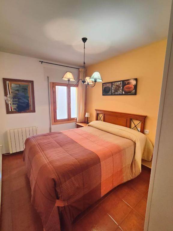 Postel nebo postele na pokoji v ubytování CASA RURAL EL CAIDERÓN