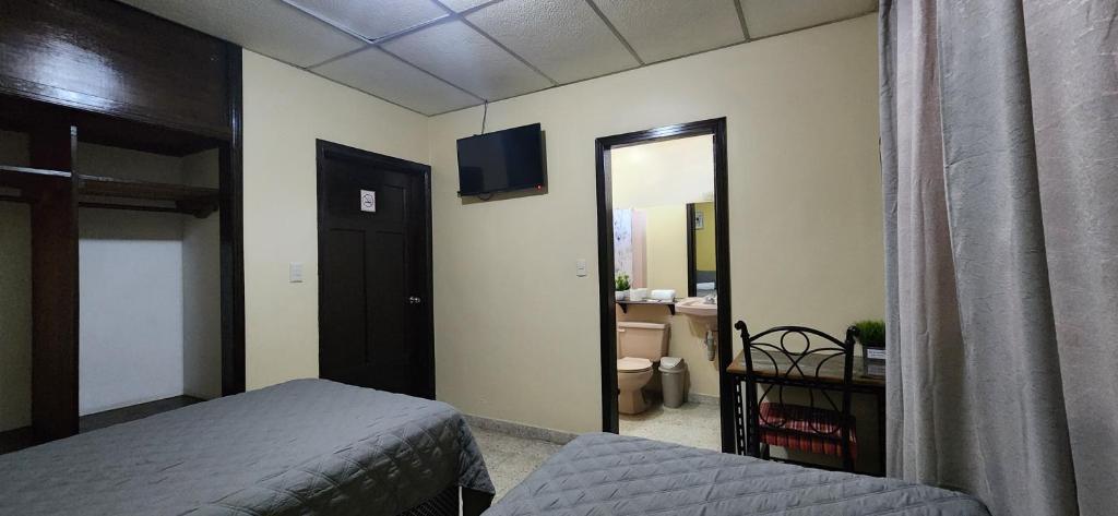 Postel nebo postele na pokoji v ubytování Casa Altamira