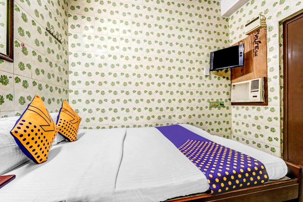 TV a/nebo společenská místnost v ubytování Hotel O Ams Annex