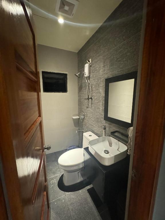 Koupelna v ubytování IAO Boutique Hotel
