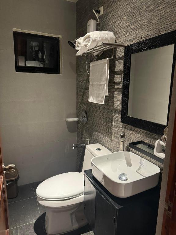 Koupelna v ubytování IAO Boutique Hotel