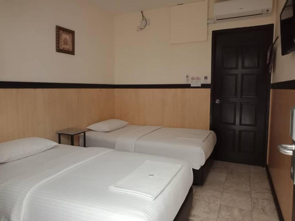 Postel nebo postele na pokoji v ubytování House 11