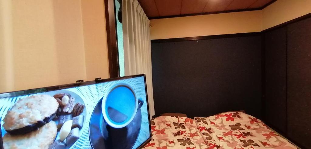 TV a/nebo společenská místnost v ubytování ARASHIMA INN 201 / Vacation STAY 162
