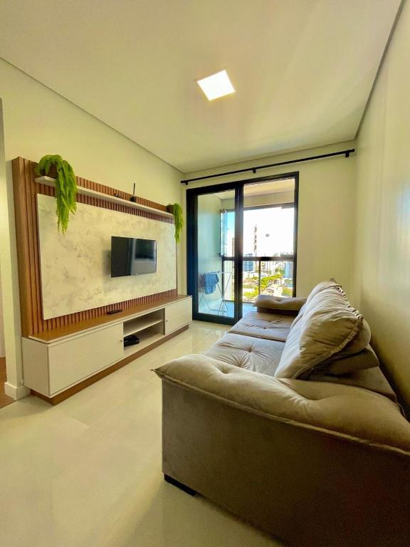 TV/trung tâm giải trí tại Icon - Conforto e Comodidade- Melhor Localização de Chapecó