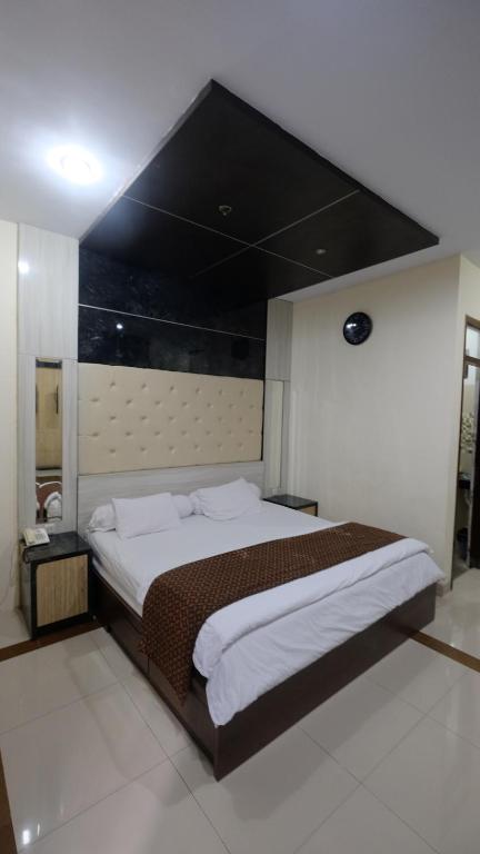 griya desa hotel & pool客房内的一张或多张床位