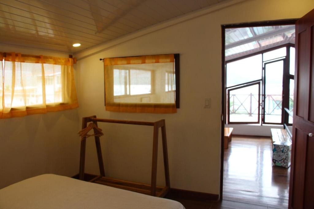 Postel nebo postele na pokoji v ubytování CASA DINIS - Loft - With View Bahia de Portobelo