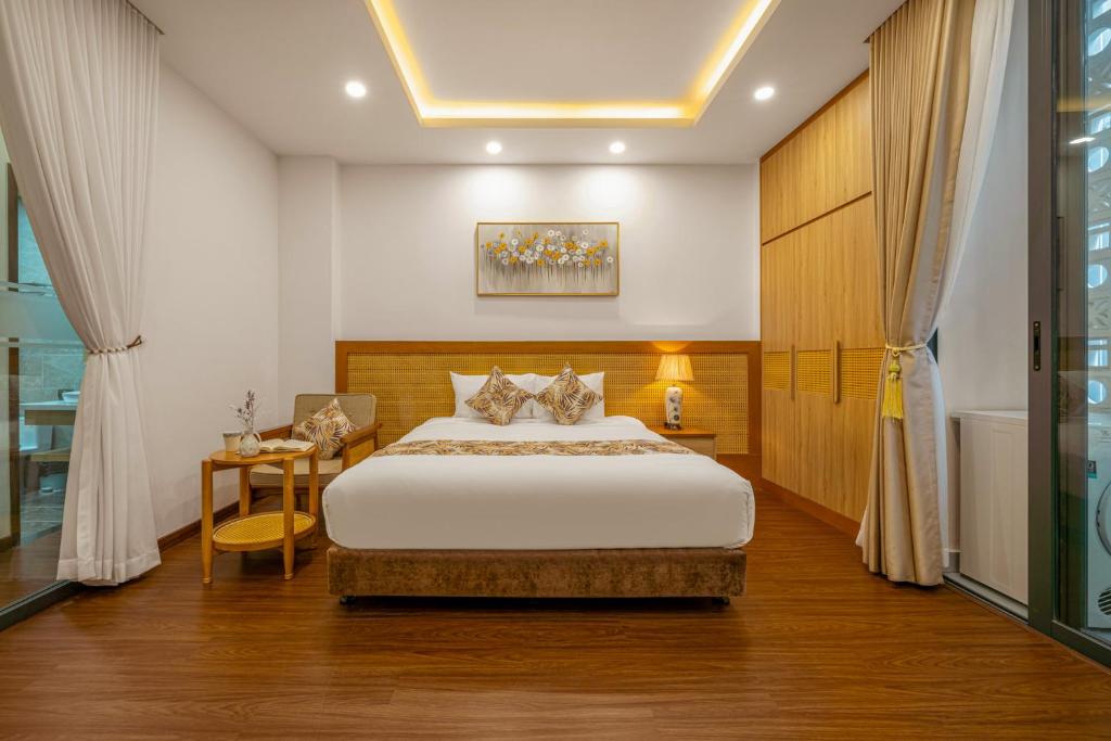 Postel nebo postele na pokoji v ubytování May Home Apartment Da Nang