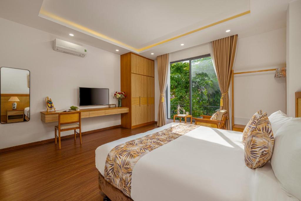 Postel nebo postele na pokoji v ubytování May Home Apartment Da Nang