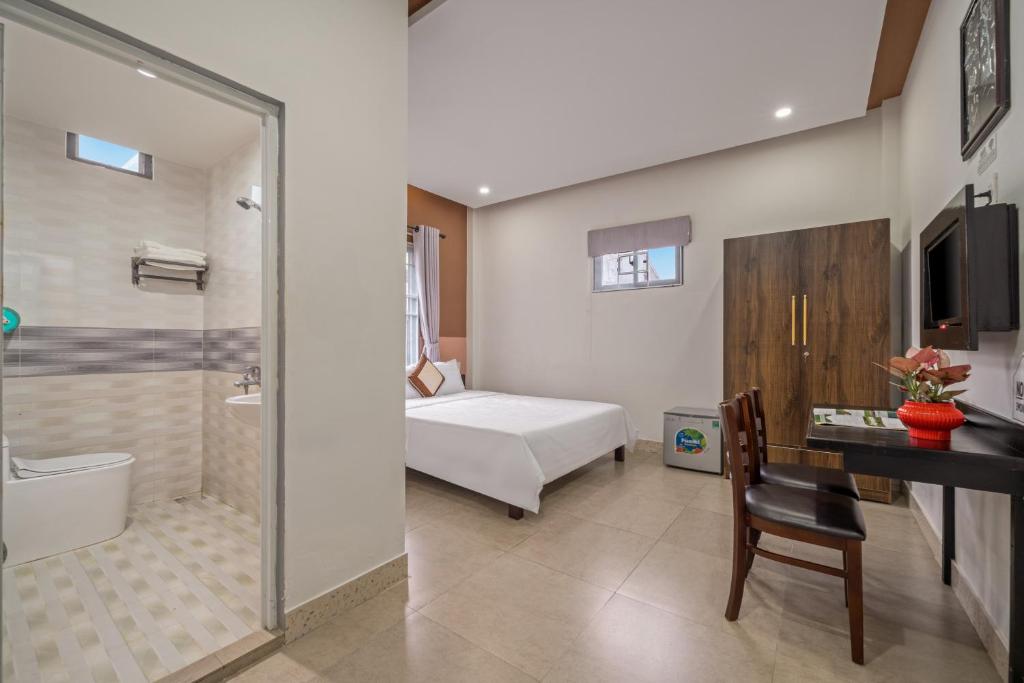 Postel nebo postele na pokoji v ubytování Bo Bo Homestay Hoi An