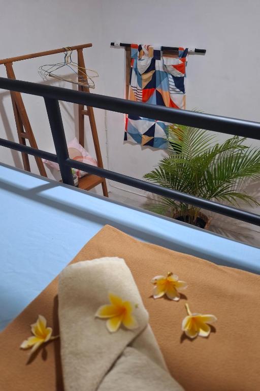 Postel nebo postele na pokoji v ubytování Bring In House Yogyakarta