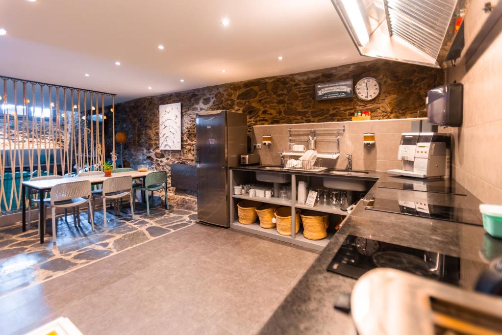 Kuchyň nebo kuchyňský kout v ubytování Mountain Hostel Tarter