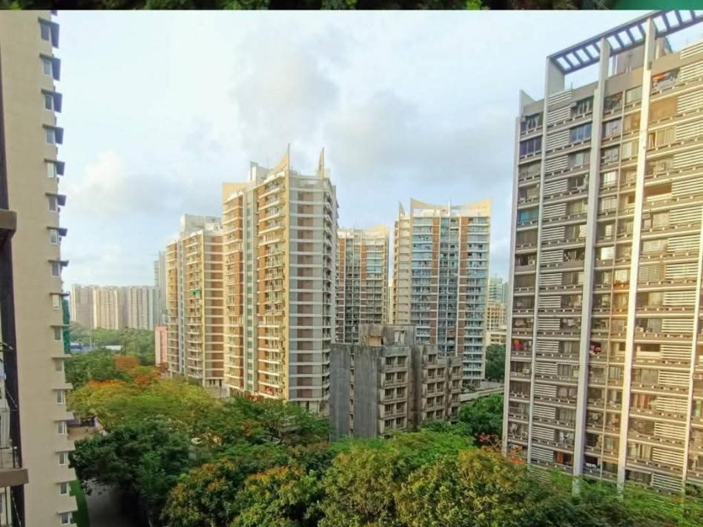 a group of tall buildings in a city at Residential Tranquil in Mumbai