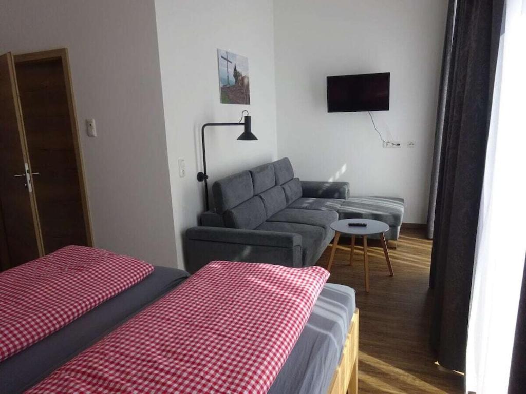 Postel nebo postele na pokoji v ubytování Alte Schreinerei Comfortable holiday residence