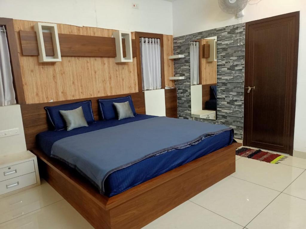 Postel nebo postele na pokoji v ubytování Hodophile Wayanad Homestay