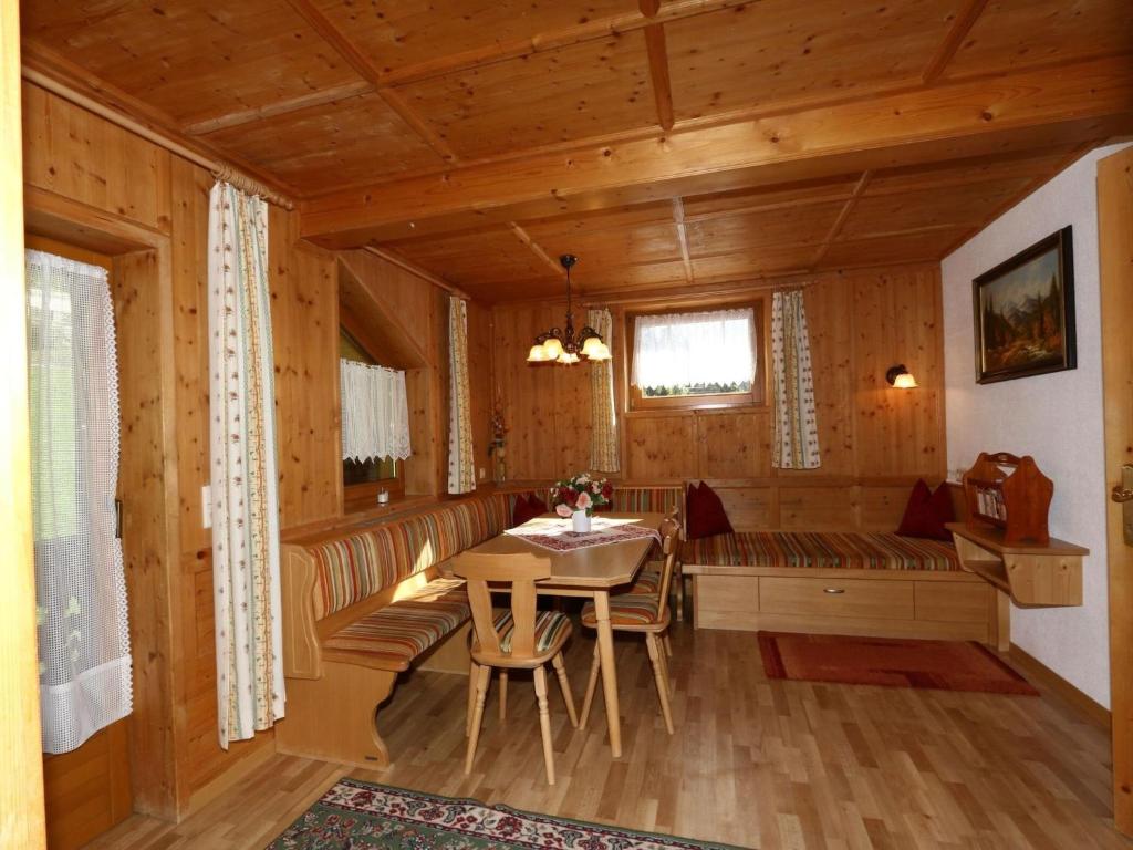 A seating area at Apartment in Mayrhofen in the mountains