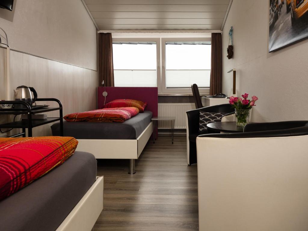 Postel nebo postele na pokoji v ubytování Hotel Brunnenbach