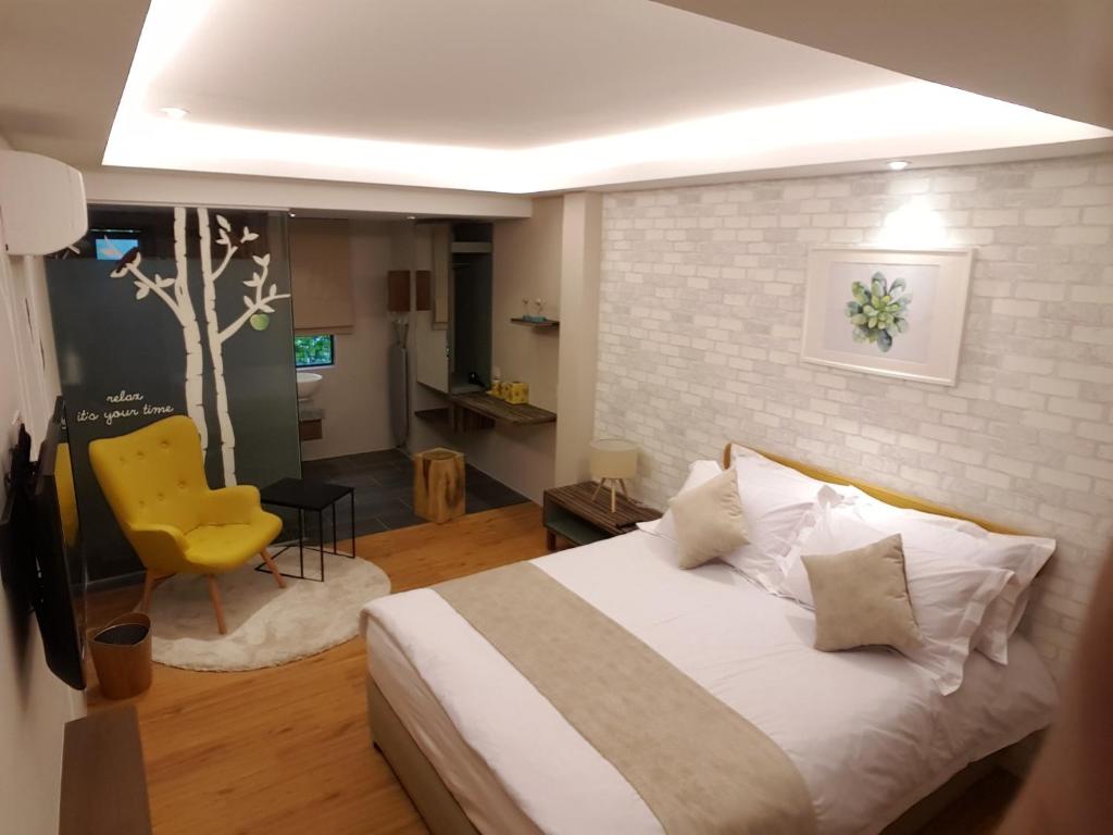 Postel nebo postele na pokoji v ubytování Sojourn Guest House