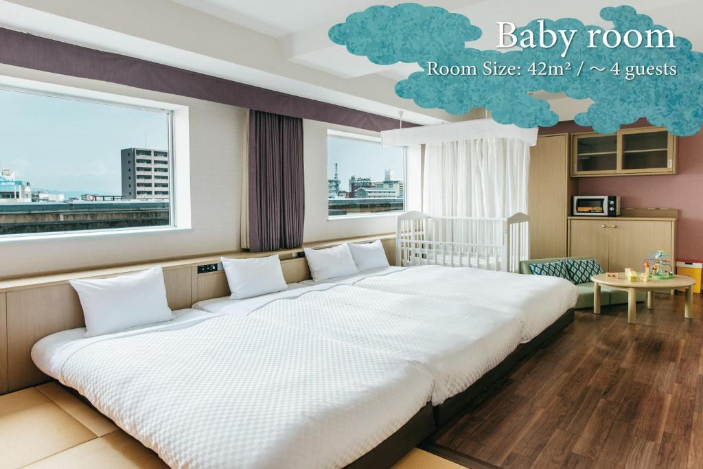 Postel nebo postele na pokoji v ubytování KAMENOI HOTEL Beppu