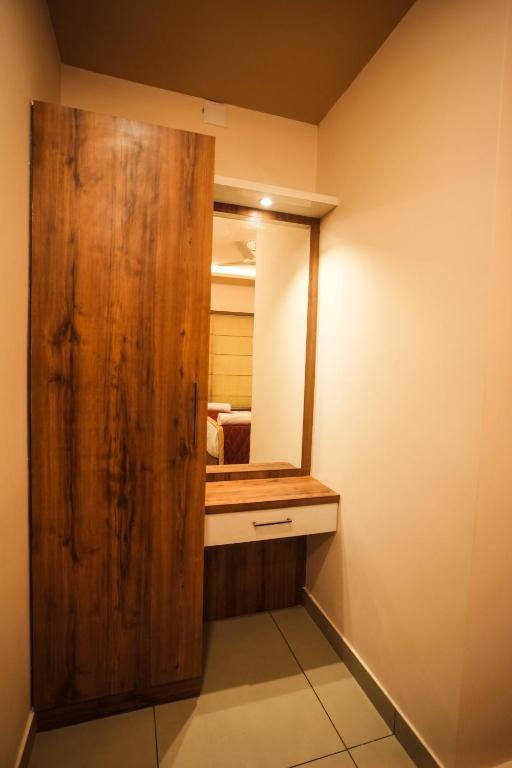 Fotografie z fotogalerie ubytování AJ Wayanad Suites v destinaci Kalpatta