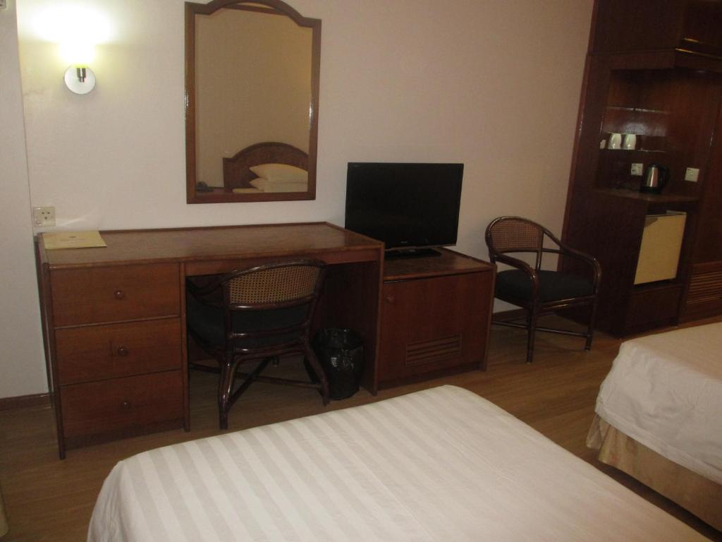 TV a/nebo společenská místnost v ubytování Sanbay Hotel