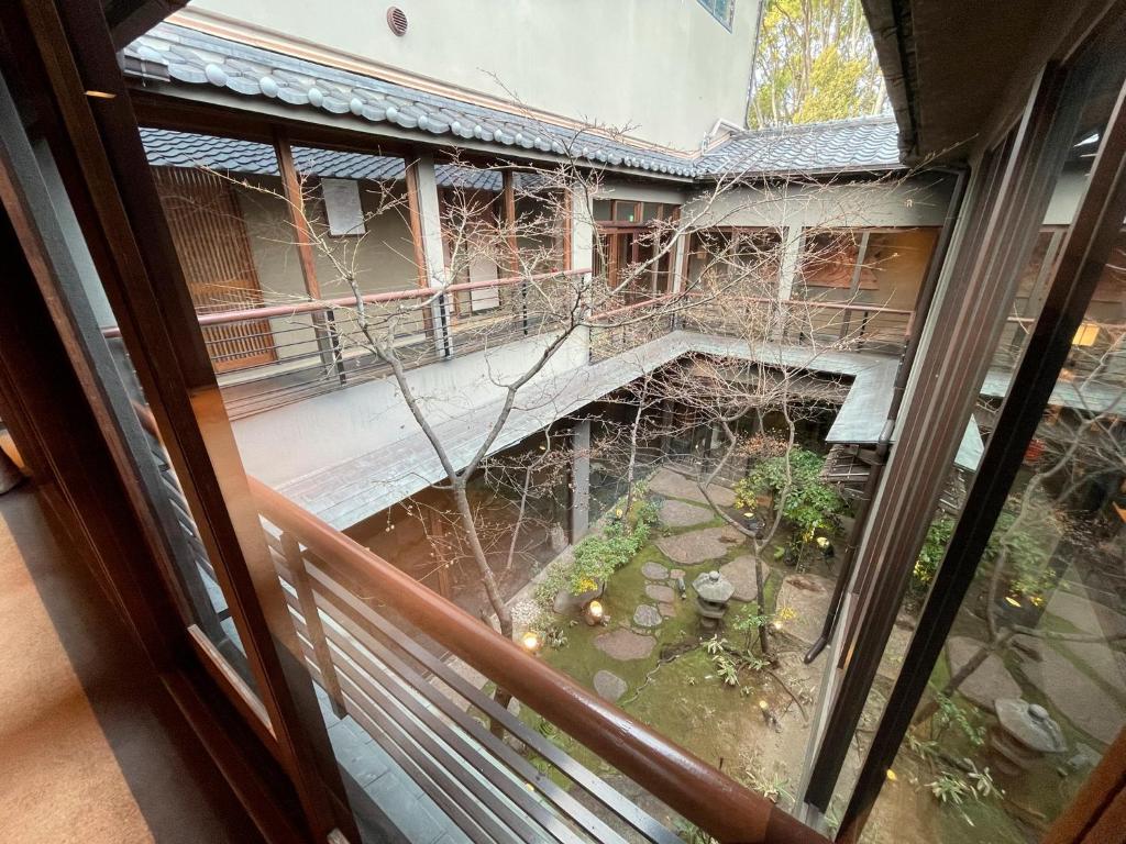 Balkón nebo terasa v ubytování Yuzuya Ryokan - Adult Only