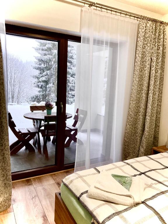 Postel nebo postele na pokoji v ubytování Chata Labaika