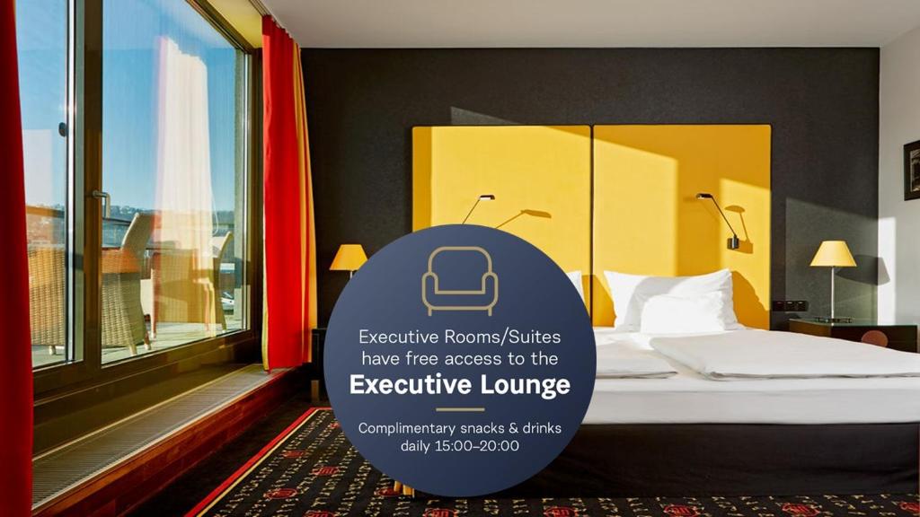 Postel nebo postele na pokoji v ubytování OREA Hotel Angelo Praha