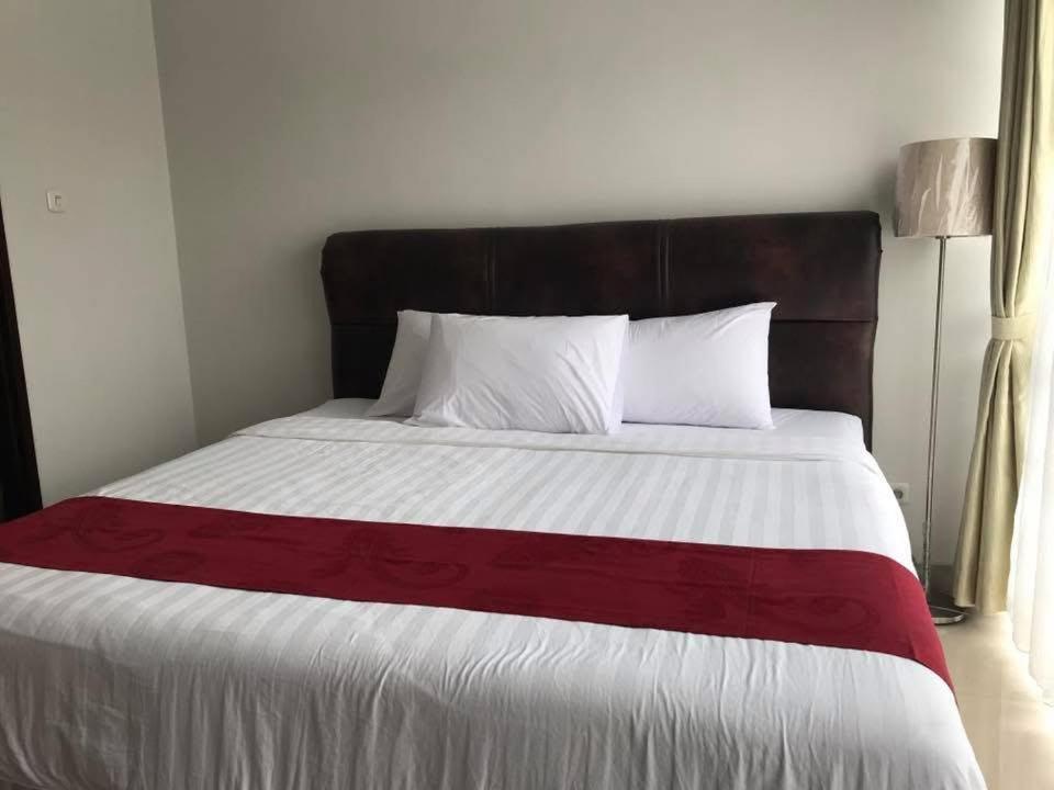 Postel nebo postele na pokoji v ubytování Resort88 Villa