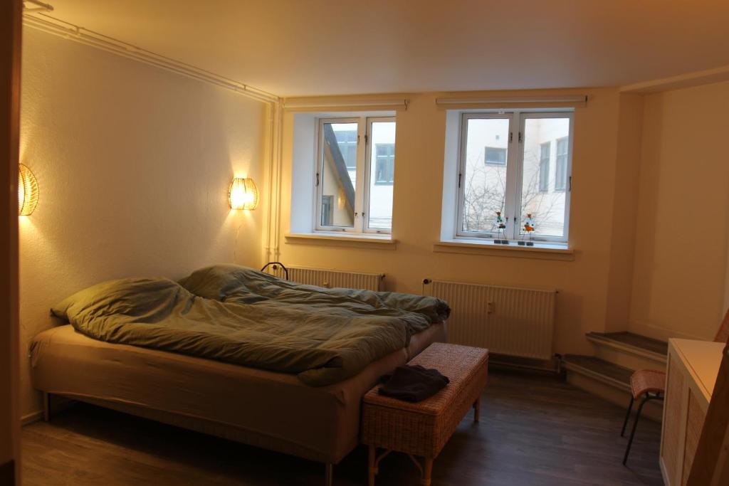 Postel nebo postele na pokoji v ubytování Visit wonderful Odense center - 3 bedroom appartment
