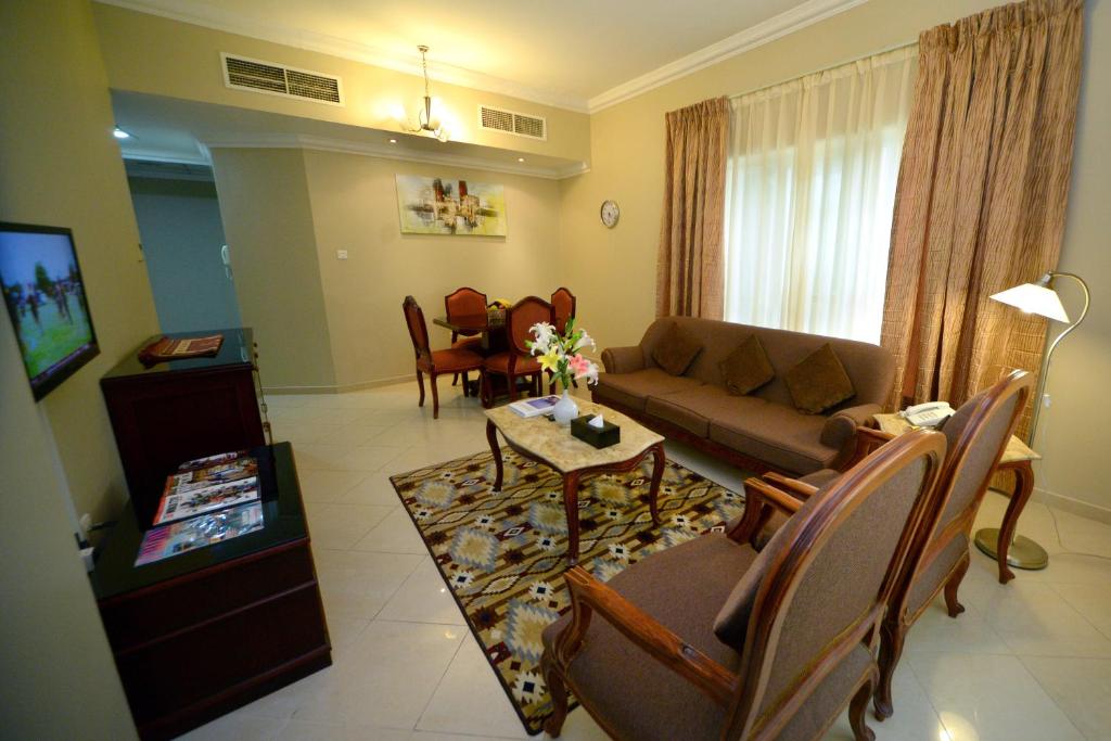 TV a/nebo společenská místnost v ubytování Emirates Stars Hotel Apartments Sharjah
