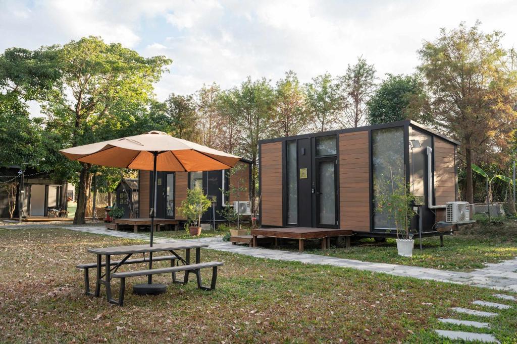 Zahrada ubytování Gandan Inn 1 by Tiny Away