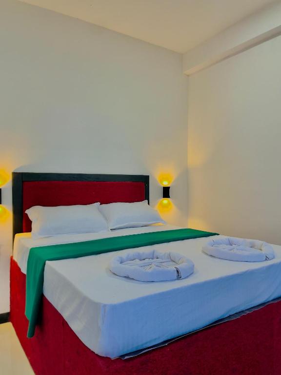 Postel nebo postele na pokoji v ubytování Cozy forest ella
