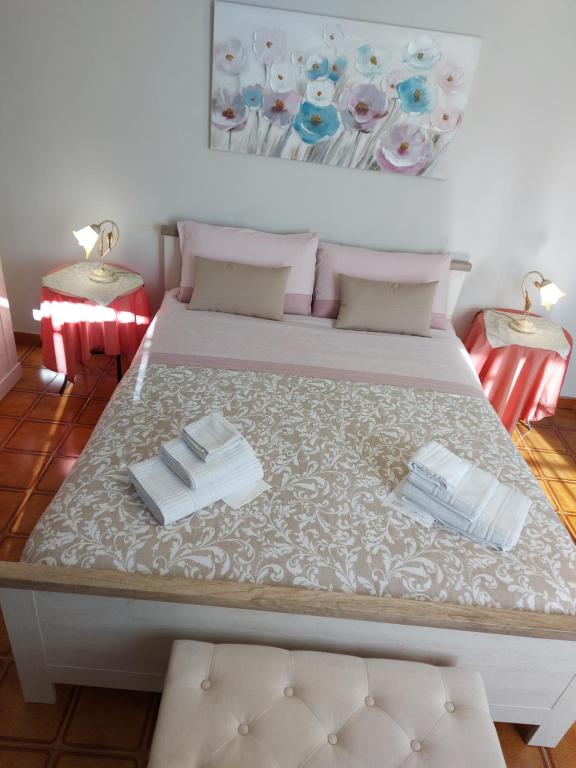 Postel nebo postele na pokoji v ubytování Casa dell'Agrifoglio