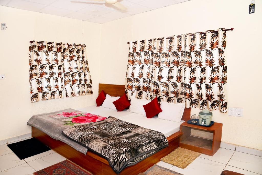 Voodi või voodid majutusasutuse Samarth home stay toas
