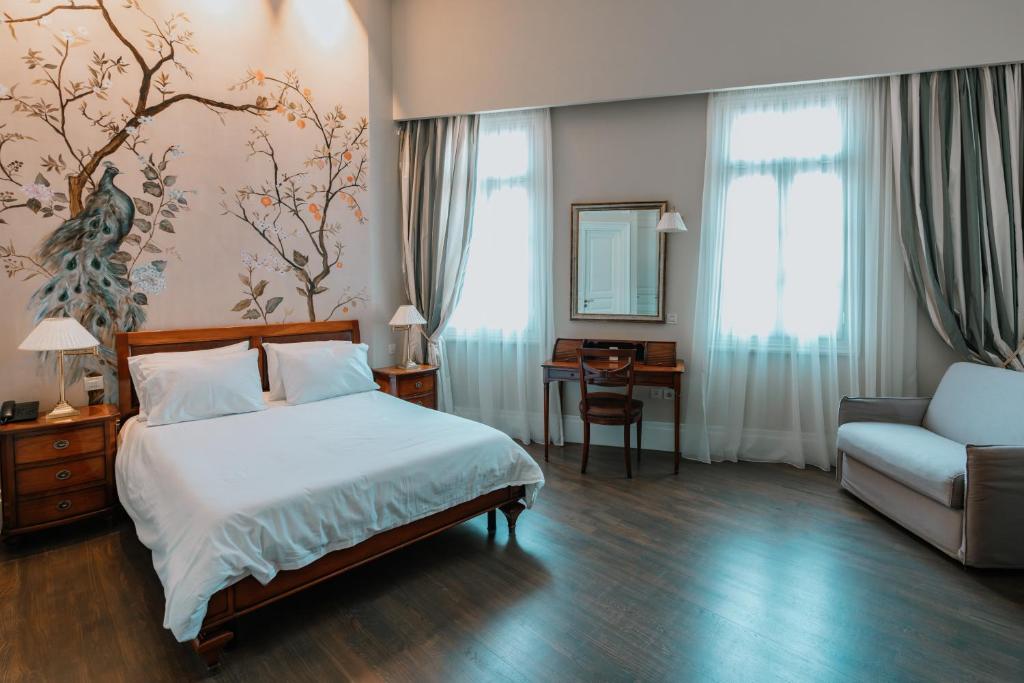 Postel nebo postele na pokoji v ubytování Xenon Inn