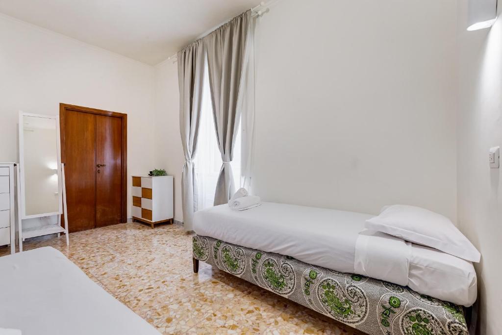 Posteľ alebo postele v izbe v ubytovaní VIVILO COLLECTION - San Vito View Apartment - 3 BDR 2 BATHS